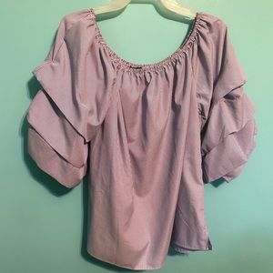 Off the shoulder blue pin striped blouse.
